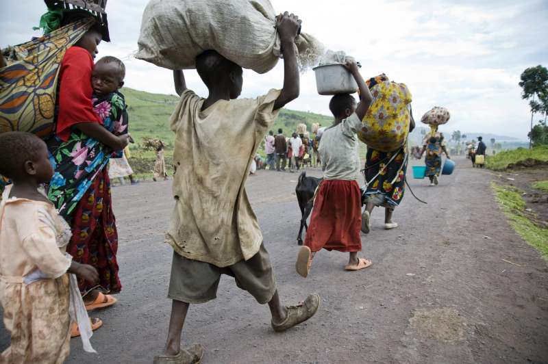 Women and Children running away from war